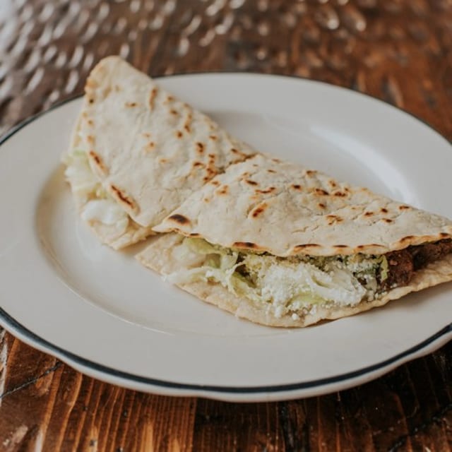 Costilla De Puerco Quesadilla.